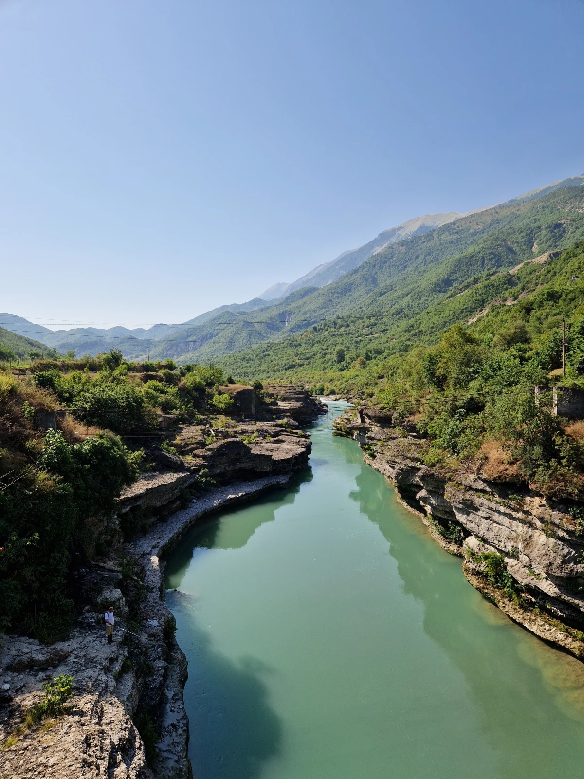 A river valley landscape in Albania, suited to a cycling journey through the north.