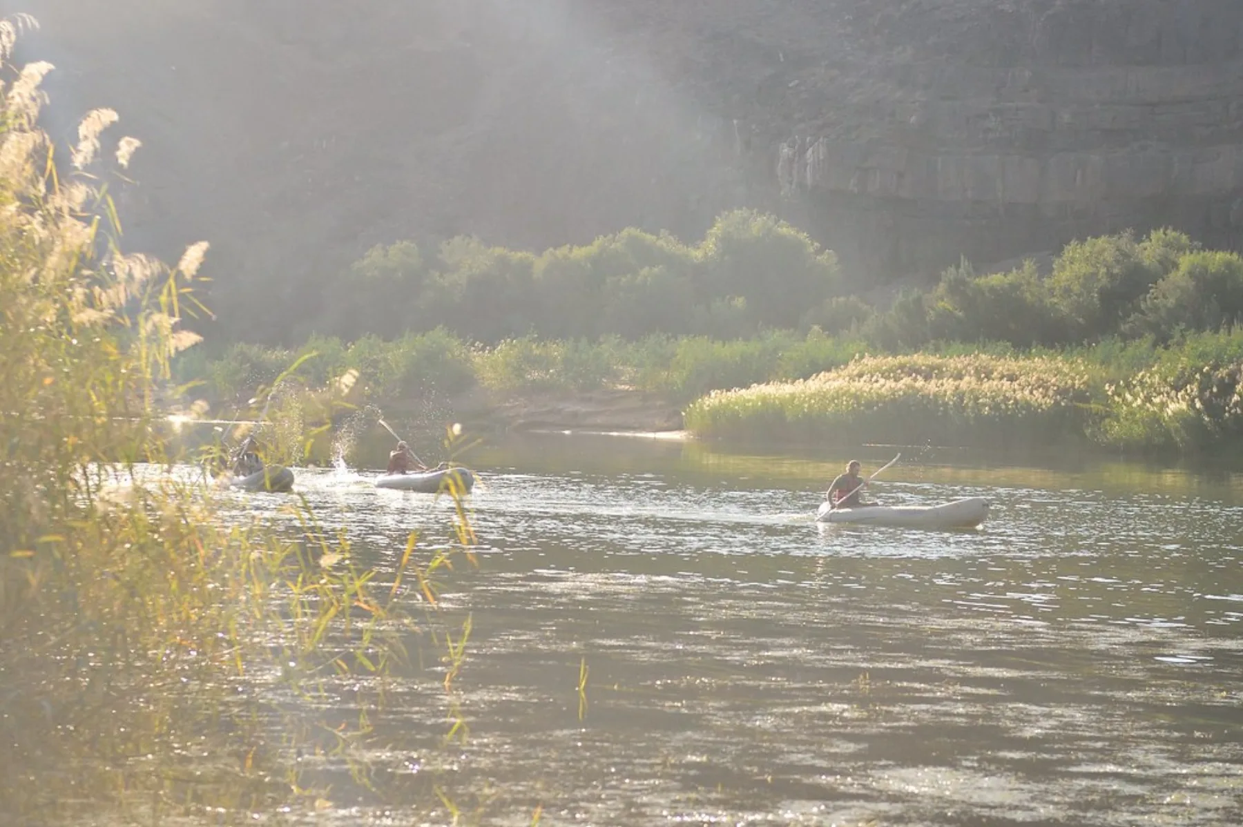 Paddlers navigate a rapid on the Orange River in South Africa.