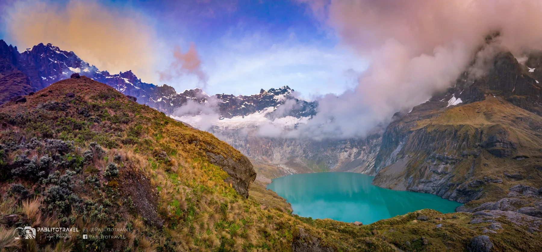 Laguna Amarilla below the jagged, cloud-wreathed summit crown of El Altar.