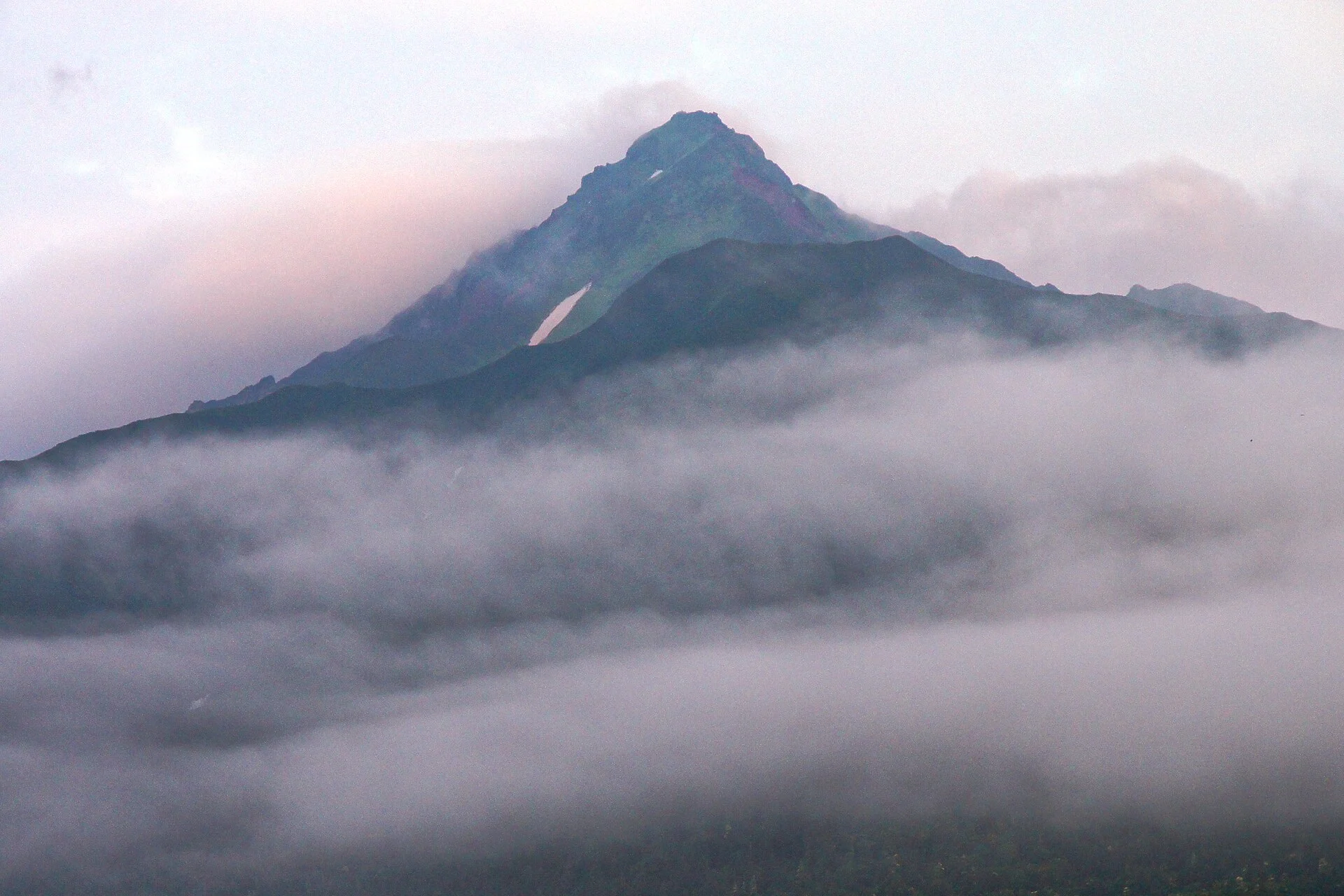 Mount Rishiri rising steeply above Rishiri Island in Hokkaido.