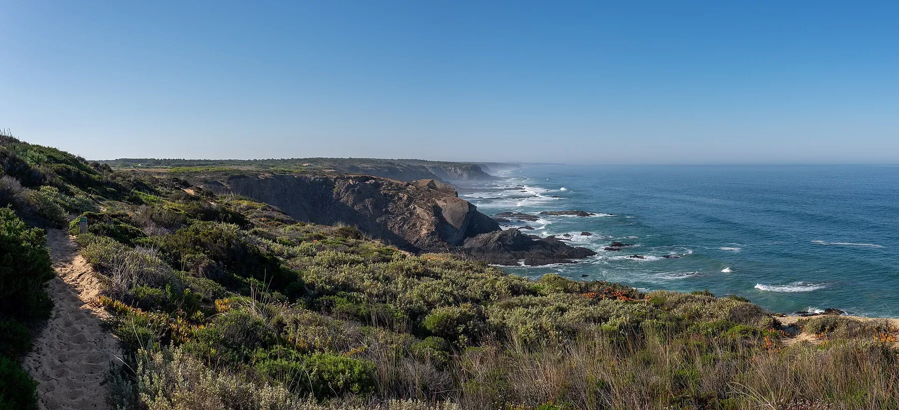 The Atlantic cliffs and path of the Fishermen's Trail near Odeceixe, Portugal.