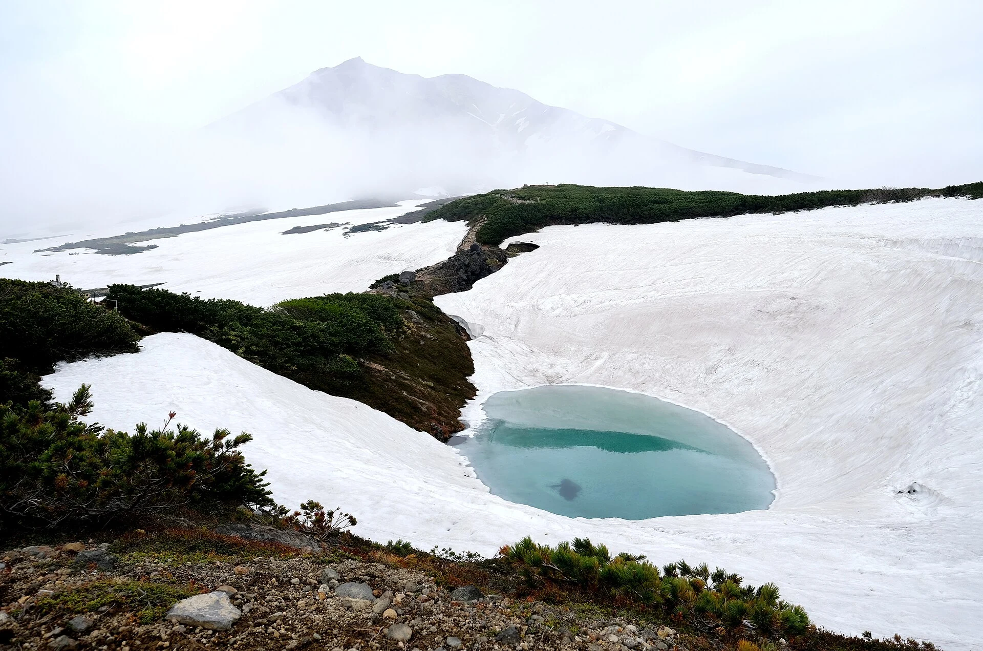 Suribachi Pond beneath Mount Asahidake in Daisetsuzan National Park.